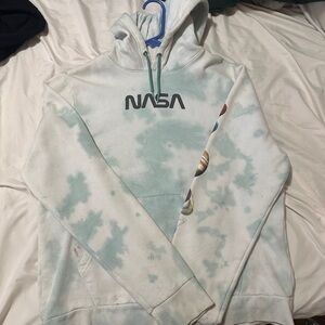 hoodie from hyper space tie dye with planets on it and says nasa on the front